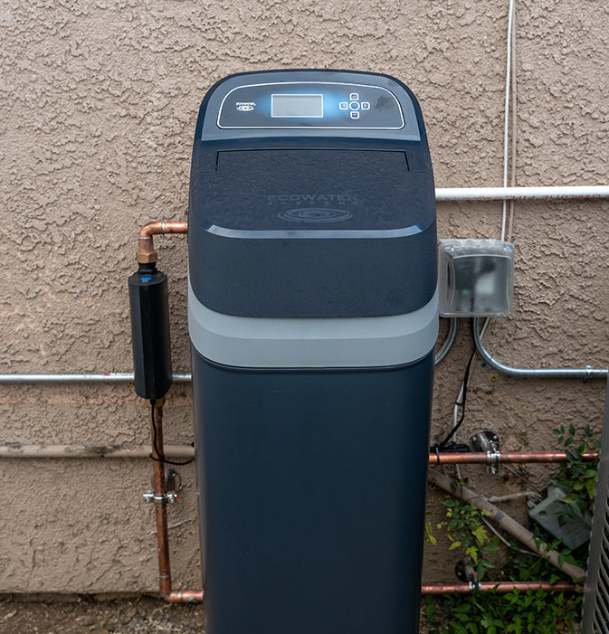 Ecowater next to a Phyn device.
